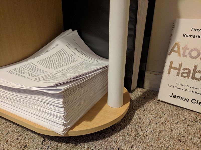 Stack of read papers.